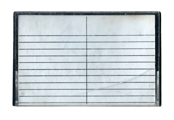 Isolated vintage cracked plastic cassette tape case with lined paper