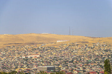 Baku, Azerbaijan. View of a village or suburb along the Baku-Sumgait highway.