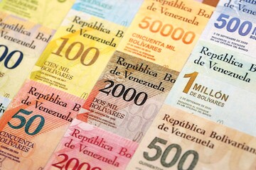 Venezuelan Bolivar currency money bills in big amount. Stack of VED currency banknotes with different denomination close up