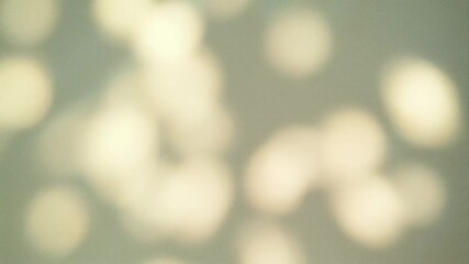 A blurred background with soft, out of focus bokeh lights in warm tones, creating a dreamy atmosphere. - Powered by Adobe