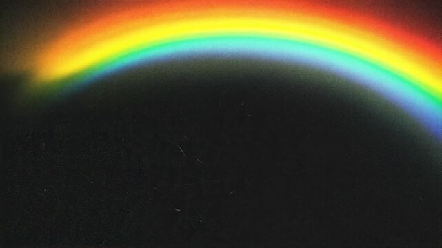 A rainbow spectrum arcs across a dark background, with a logo overlay from Adobe Stock.