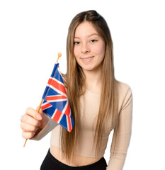 Portrait of smiling satisfied girl holding British flag standing over transparent background. PNG transparent.