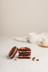 Decadent Chocolate Sandwich Cookies with Cream Filling and Toffee Topping