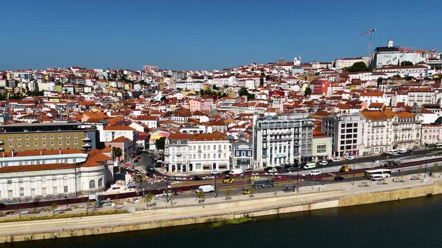 Aerial Drone View of Coimbra, Portugal &mdash; Historic City with Ancient University, Old Town Architecture, Scenic Mondego River, Cinematic Sunset Light, Portugal Travel and Panoramic Footage