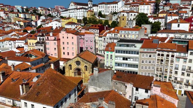 Aerial Drone View of Coimbra, Portugal &mdash; Historic City with Ancient University, Old Town Architecture, Scenic Mondego River, Cinematic Sunset Light, Portugal Travel and Panoramic Footage
