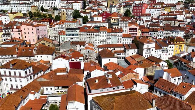 Aerial Drone View of Coimbra, Portugal &mdash; Historic City with Ancient University, Old Town Architecture, Scenic Mondego River, Cinematic Sunset Light, Portugal Travel and Panoramic Footage