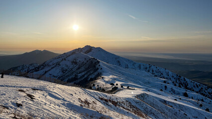 Sunset over the mountain peak