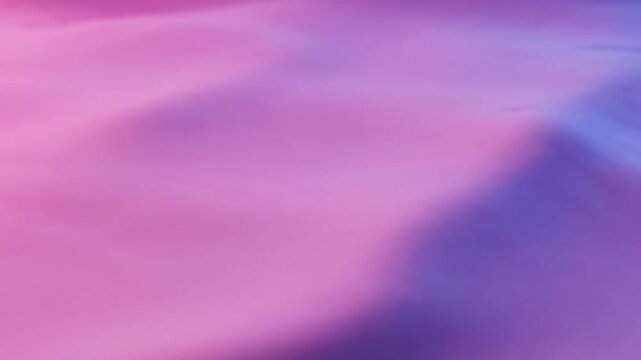 A luxurious abstract purple background features smooth flowing waves of silk and satin fabric texture with soft violet light and motion design for a high-quality computer wallpaper illustration