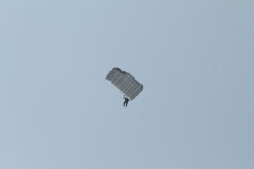 paraglider in the blue sky