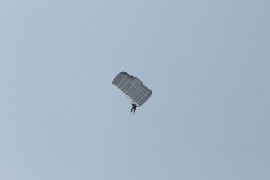 paraglider in the blue sky