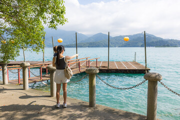 Mother traveling with baby at Sun Moon Lake Taiwan
