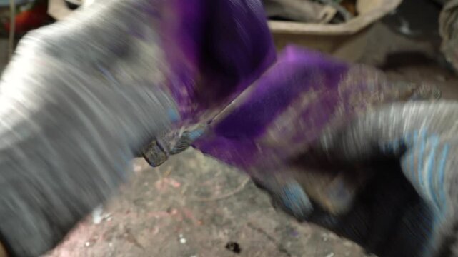 Discover how to mix and pour resin while creating beautiful purple art pieces in a workshop setting. Watch as the colors transform and come to life.