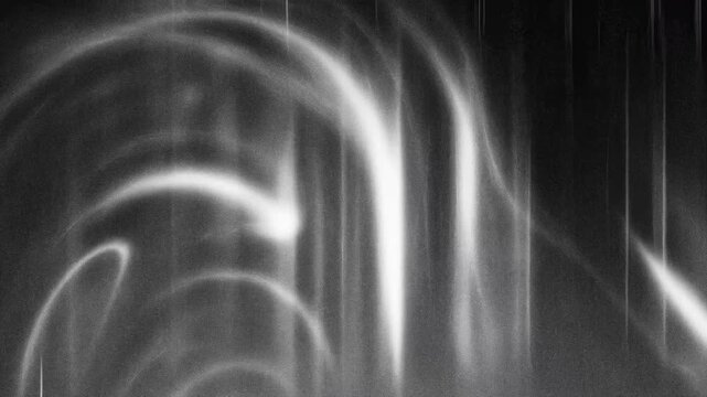Abstract black and white image showcasing soft curves and lines with a slightly blurred effect.