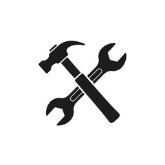Black silhouette of crossed hammer and wrench on white background