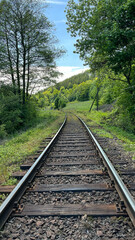Obraz premium An abandoned single-lane railway in Poland
