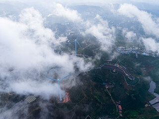 Obraz premium Aerial view of Wind Power Generation in cloud-covered Da lat, Vietnam