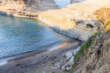 Canal d'amour sea channel rock formation and beach in Corfu, Greece