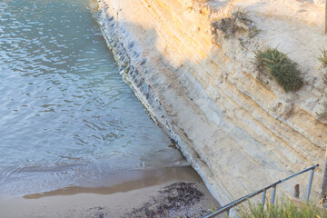 Canal d'amour sea channel rock formation and beach in Corfu, Greece