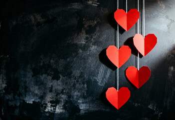 Happy Valentines Day holiday poster, flyer, greeting card, love, mothers day, romantic hanging hearts on black wall