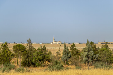 A mosque with a towering minaret near Khizi, a city in Azerbaijan.