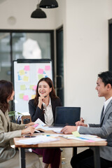 Group of male and female lawyers are giving legal advice in an office.