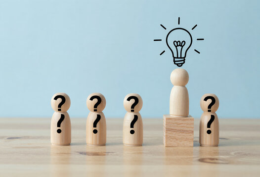 Ideas & Solutions: Wood Figures With Question Marks and Light Bulb