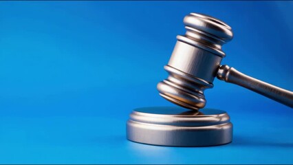 Wooden gavel on a blue background, symbol of legal authority, justice administration, courtroom decision making, judicial system tool, legal profession emblem, law and order representation - Powered by Adobe
