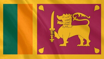 Sri Lanka&rsquo;s flag with golden lion on maroon, flanked by green and orange stripes and four bo leaves.