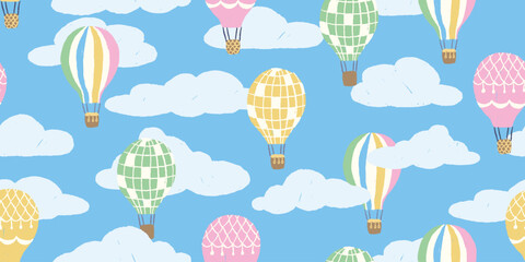 Pastel seamless pattern with hot air balloons and clouds. Kids aerostat background © Anna Volkova