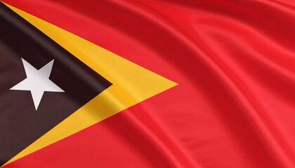 Timor-Leste flag with red field, black and yellow triangles, and white star in center.