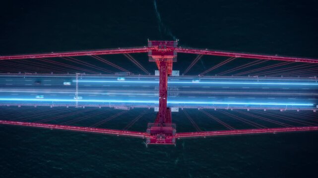 Futuristic aerial view of traffic crossing a bridge. Glowing digital overlay lines representing data flow and network connection - Powered by Adobe
