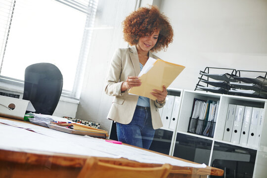 Happy woman, admin or checking documents with folder for company finance or report in office. Female person, employee or administrator with paperwork or file for business expenses or financial review