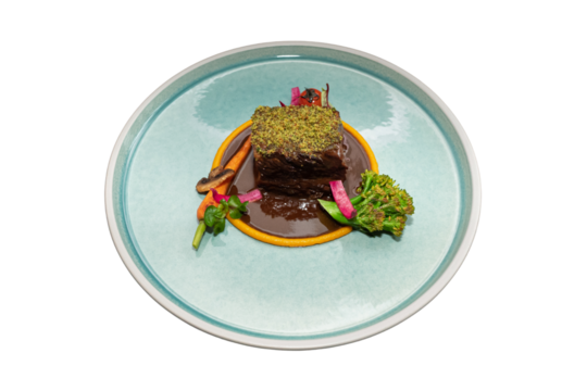 Gourmet dish on a designer plate. The dish presents a well-plated serving of food, showcasing culinary artistry and attention to detail. 