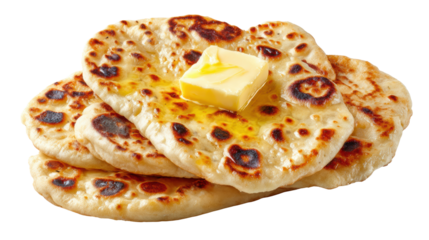 Delicious flatbreads stacked with butter on top, isolated on a white background.