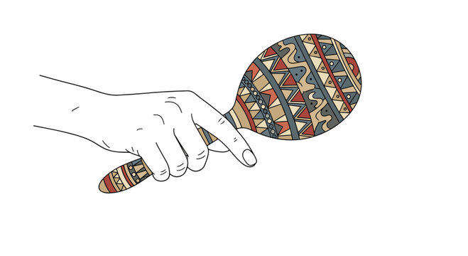 A human hand holds a colorful maraca, showcasing intricate tribal patterns on the musical instrument.