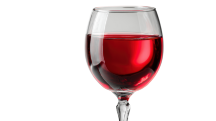 Red wine in a clear glass, isolated on a white background.