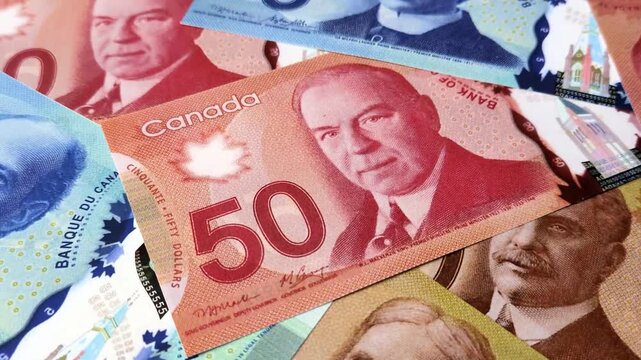 Money, currency of Canada, dollar banknotes of various denominations. Canadian money as a financial background for your design