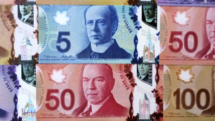 Money, currency of Canada, dollar banknotes of various denominations. Canadian money as a financial background for your design - Powered by Adobe
