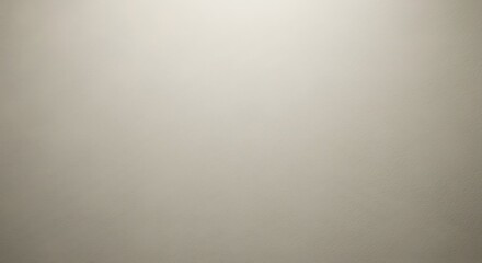 Obraz premium Soft gradient of taupe and cream shades illuminated by top light.