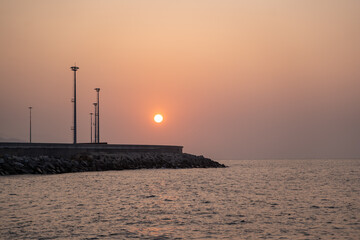 Peaceful seaside scene, Tranquil coastal sunrise imagery