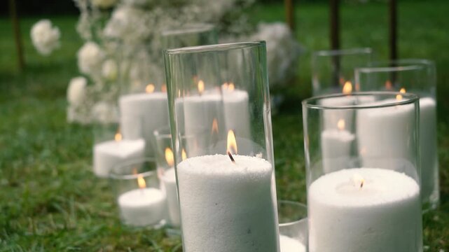 Beautiful white roses and eustoma flowers with petals and a romantic atmosphere. Outdoor wedding ceremony for the bride and groom. Decor and floristry.