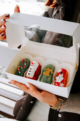 Deliciously decorated holiday pastries in a gift box during winter season