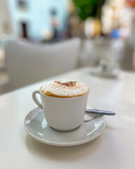 Cappuccino with Cocoa in Outdoor Cafe