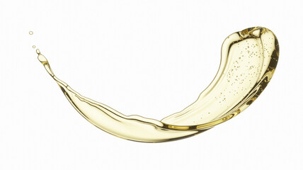 Splash of golden liquid against white background
