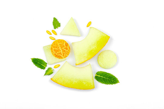 Geometric pattern of fresh melon pieces cut into squares, circles, triangles. Abstract food design