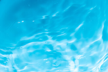Obraz premium Macro blue water wave texture,Banner of Blue Abstract water background texture with ripples and waves,Blue macro water wave texture and circles.