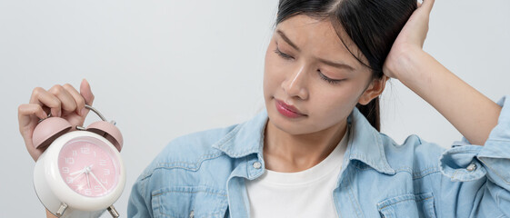 Stress Asia young woman show clock alarm, lady is late appointment or work or class study, overslept, difficulty get up in mornings, time worried, not on time, sleepy, over due, Hurry up time