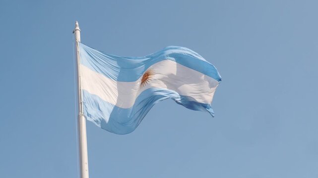 The Argentine flag waving in open sky expressing national identity, civic symbolism and a sense of unity across the country 