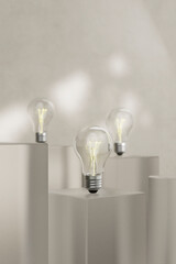 3D render of glowing bulbs on tall abstract blocks with soft focus