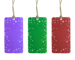 PNG image of Festive holiday gift tags in purple green and red with snowflake designs and twine hangers perfect for christmas presents and seasonal decorations on transparent background
